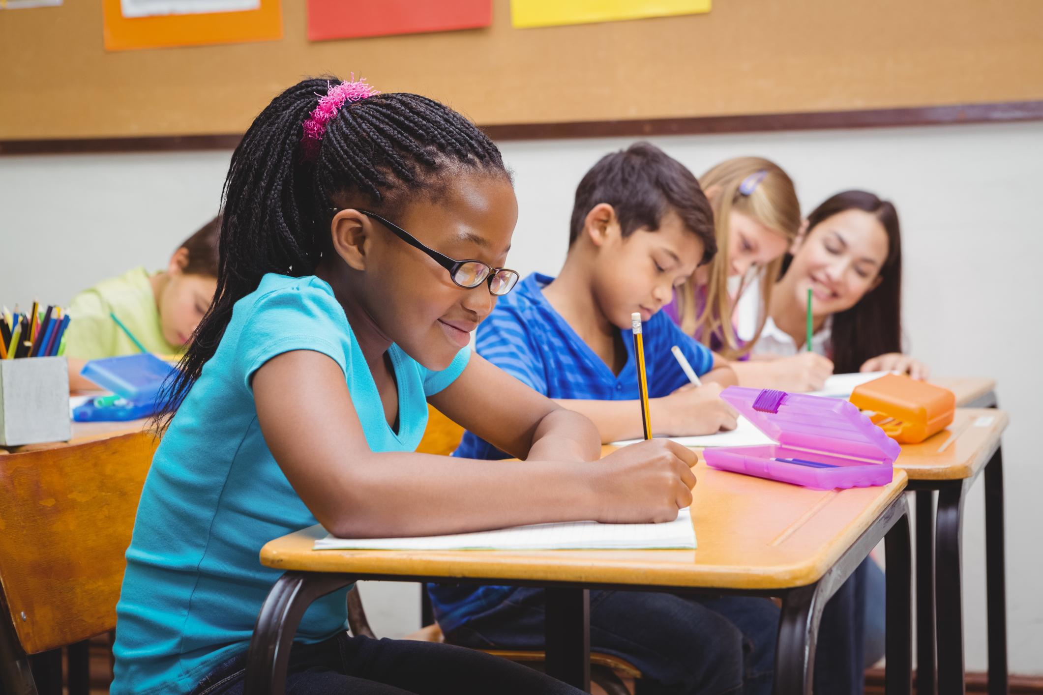 Kids studying in a school